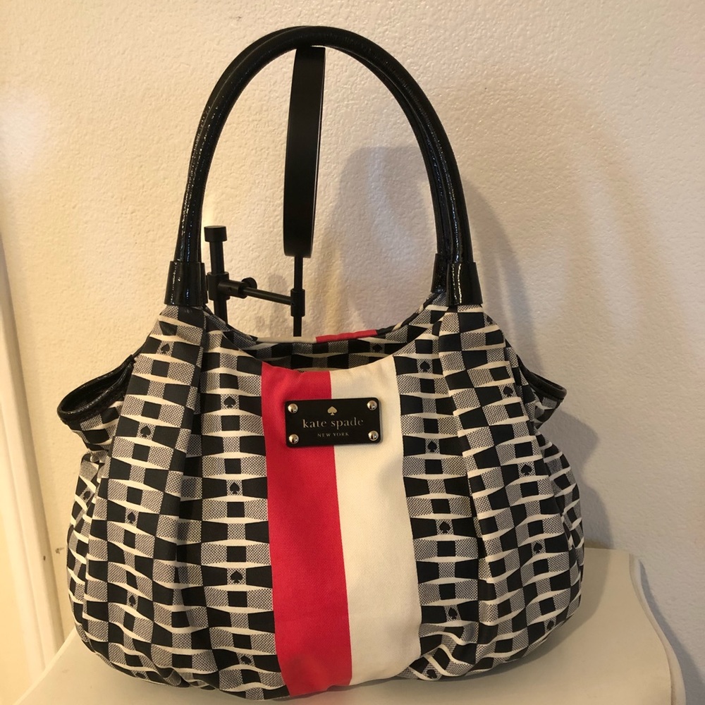 Kate Spade Hobo style bag- black/red/white in color, bottom feet- roomy satchel
